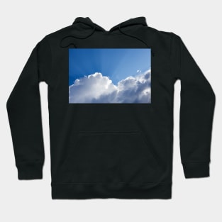 Sun rays shining behind cloud in the sky Hoodie